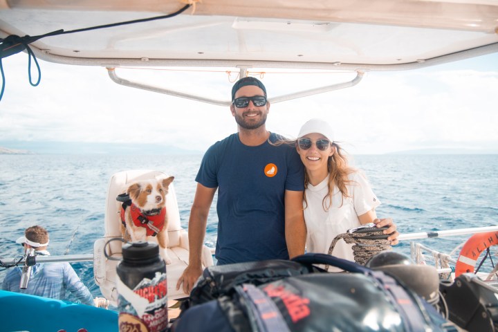 a group of people on a boat in the water