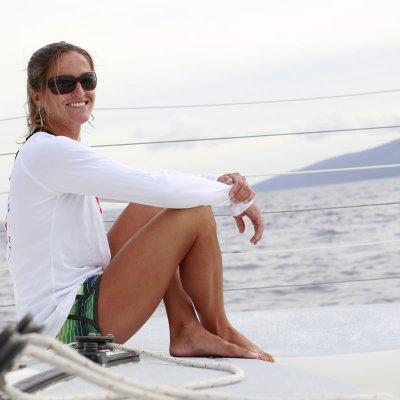 a person riding a surf board in the snow