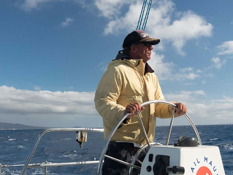 a man water skiing behind a boat