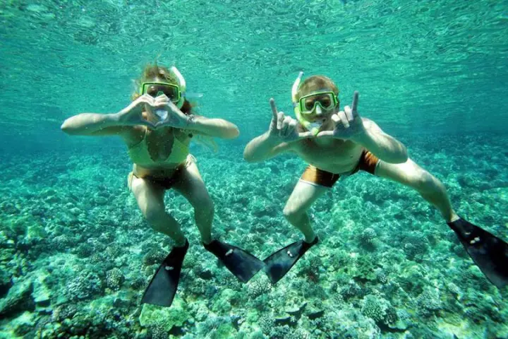 a woman swimming in the water