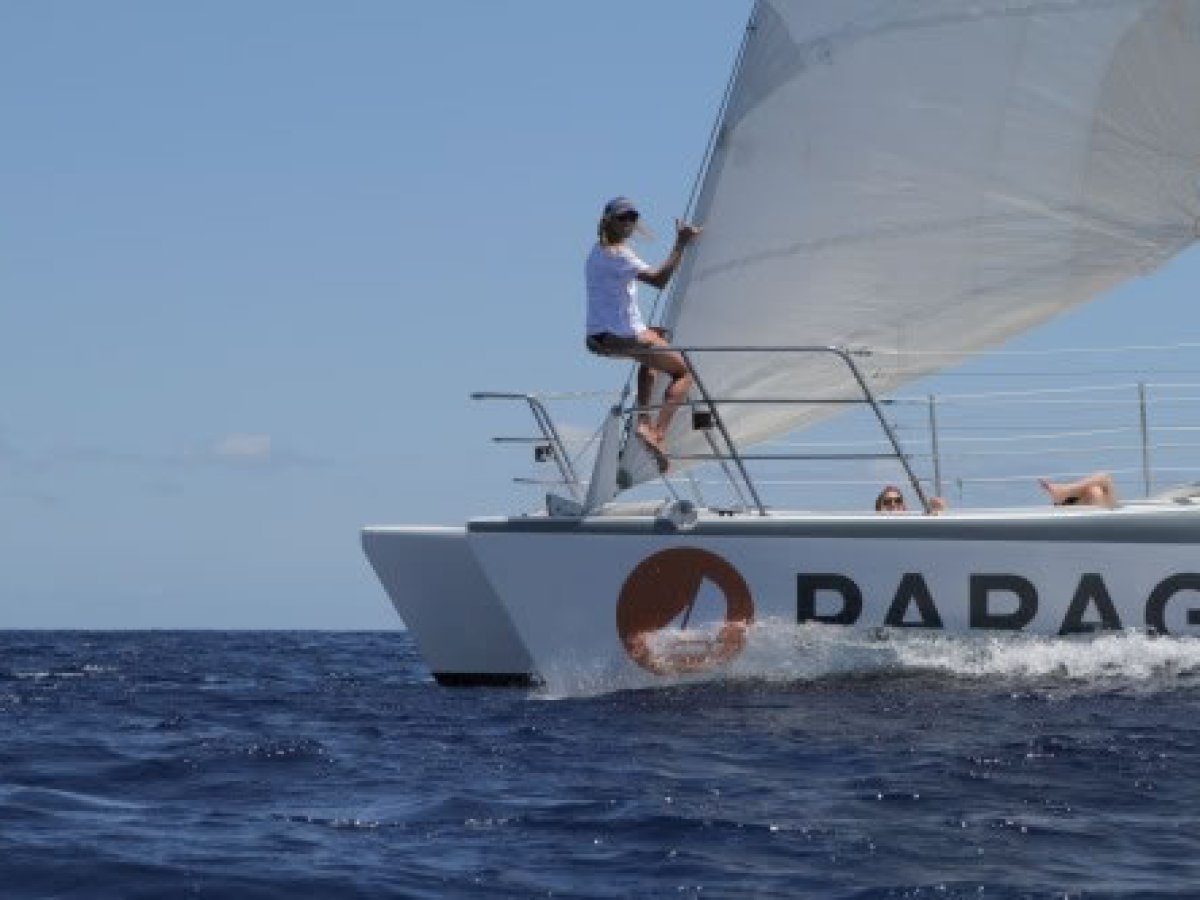 a man riding on the back of a boat