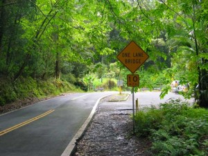 a sign on the side of a road