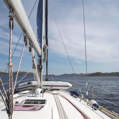 a boat is docked next to a body of water