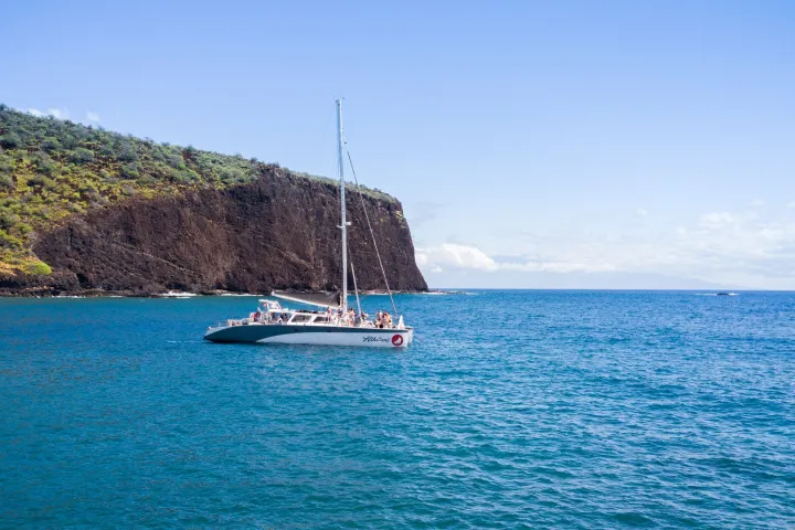 a small boat in a large body of water