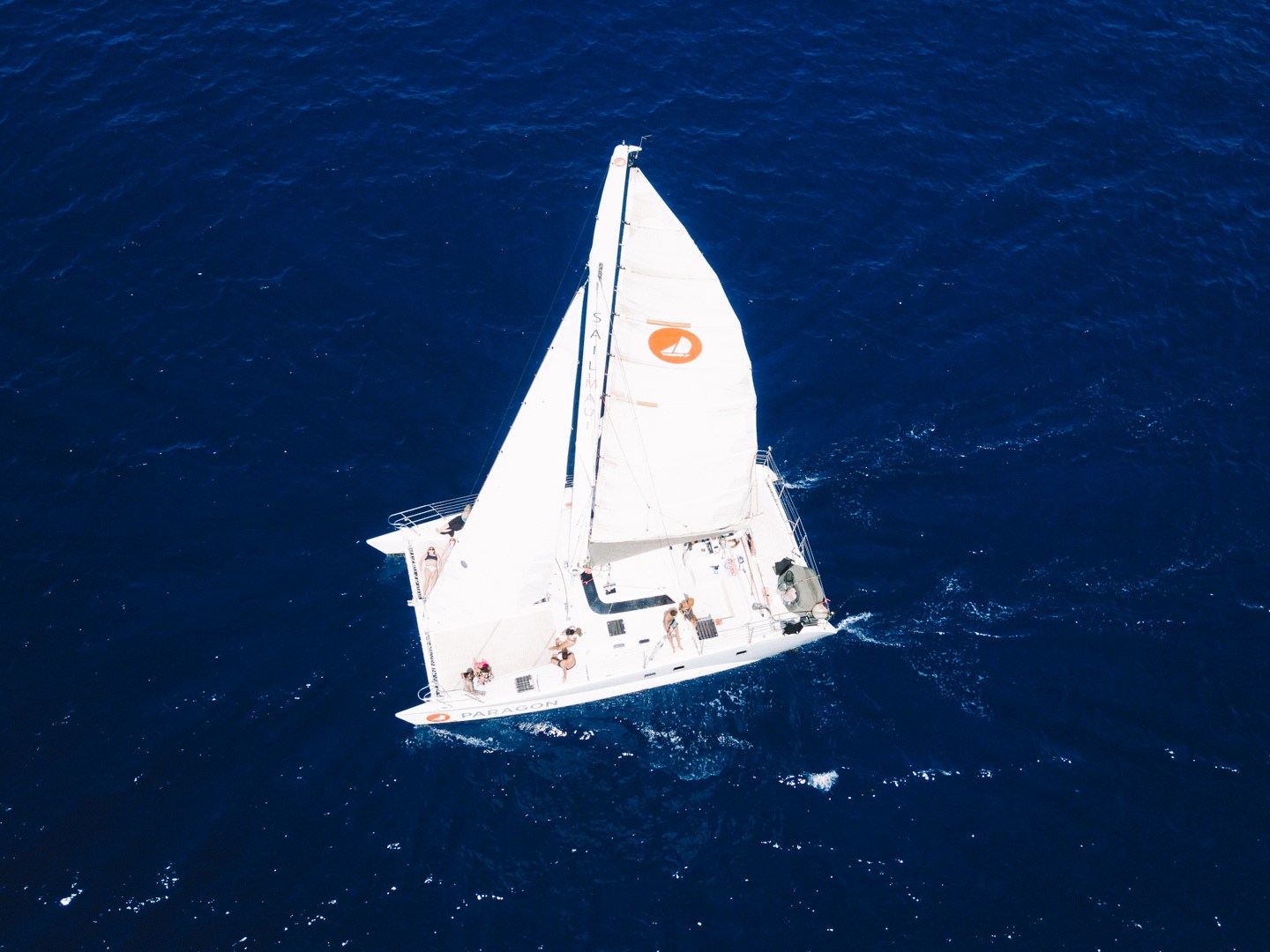 a small boat in a large body of water