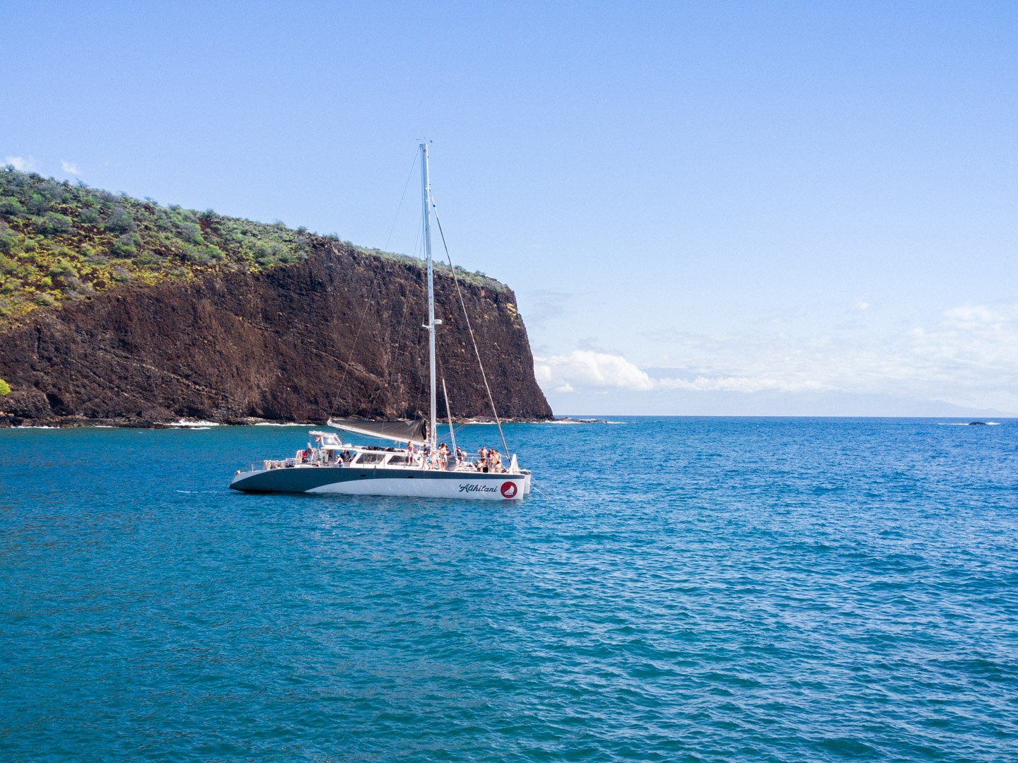 a small boat in a large body of water