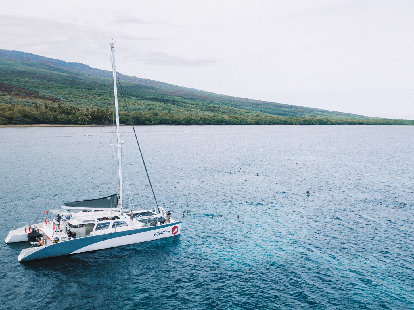 a small boat in a large body of water