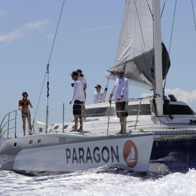 a group of people riding on the back of a boat