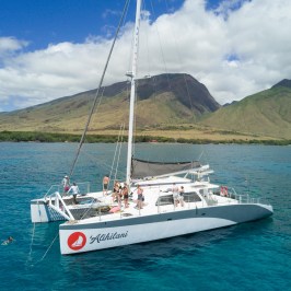 a small boat in a large body of water