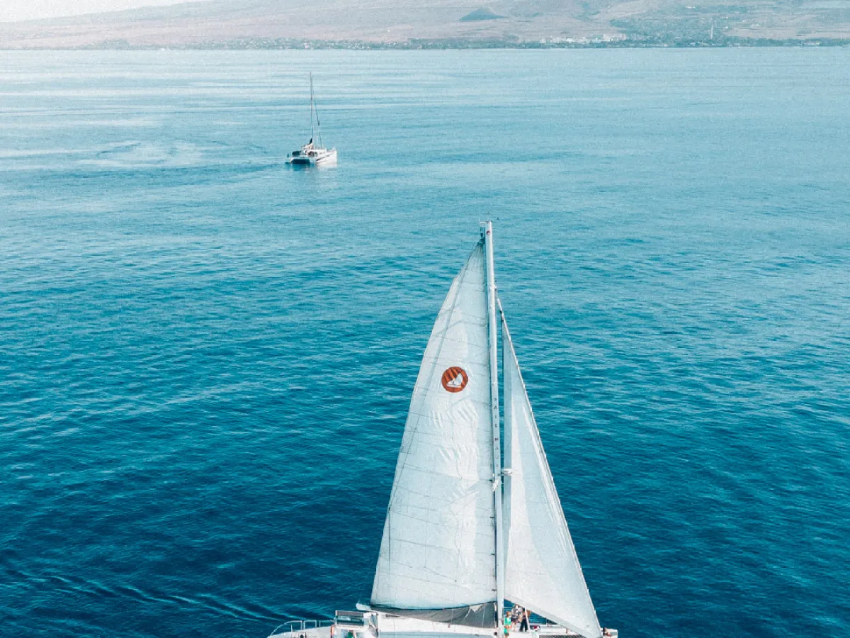 a small boat in a large body of water