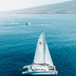 a small boat in a large body of water
